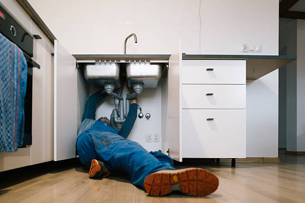Professional Emergency Plumber technician working in Madison, SD